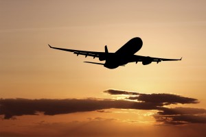 airliner taking off at dusk